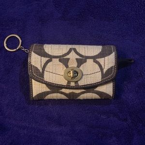 Brown and cream Coach wallet